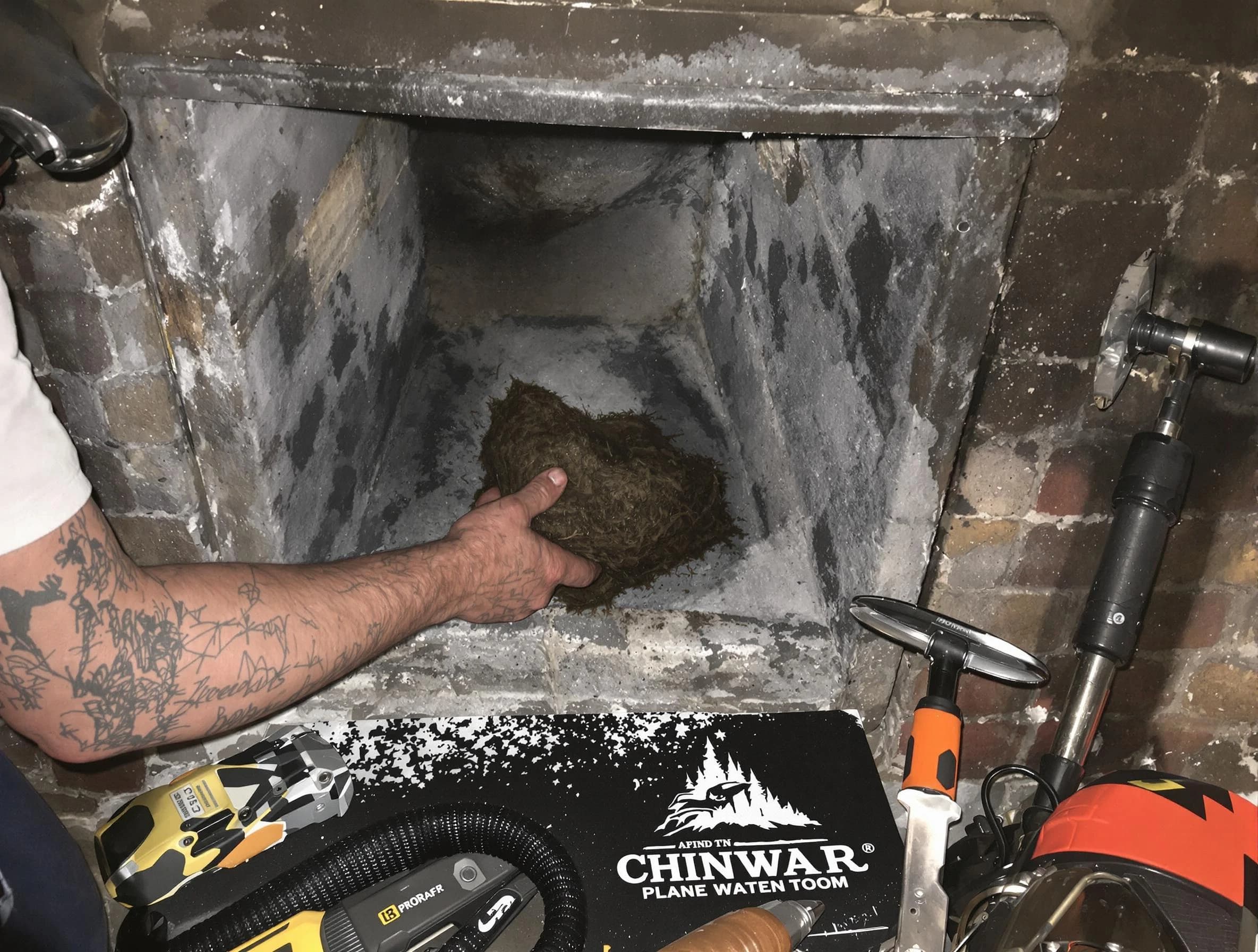 Manchester Chimney Sweep safely removing debris and screening chimney in Manchester, NJ